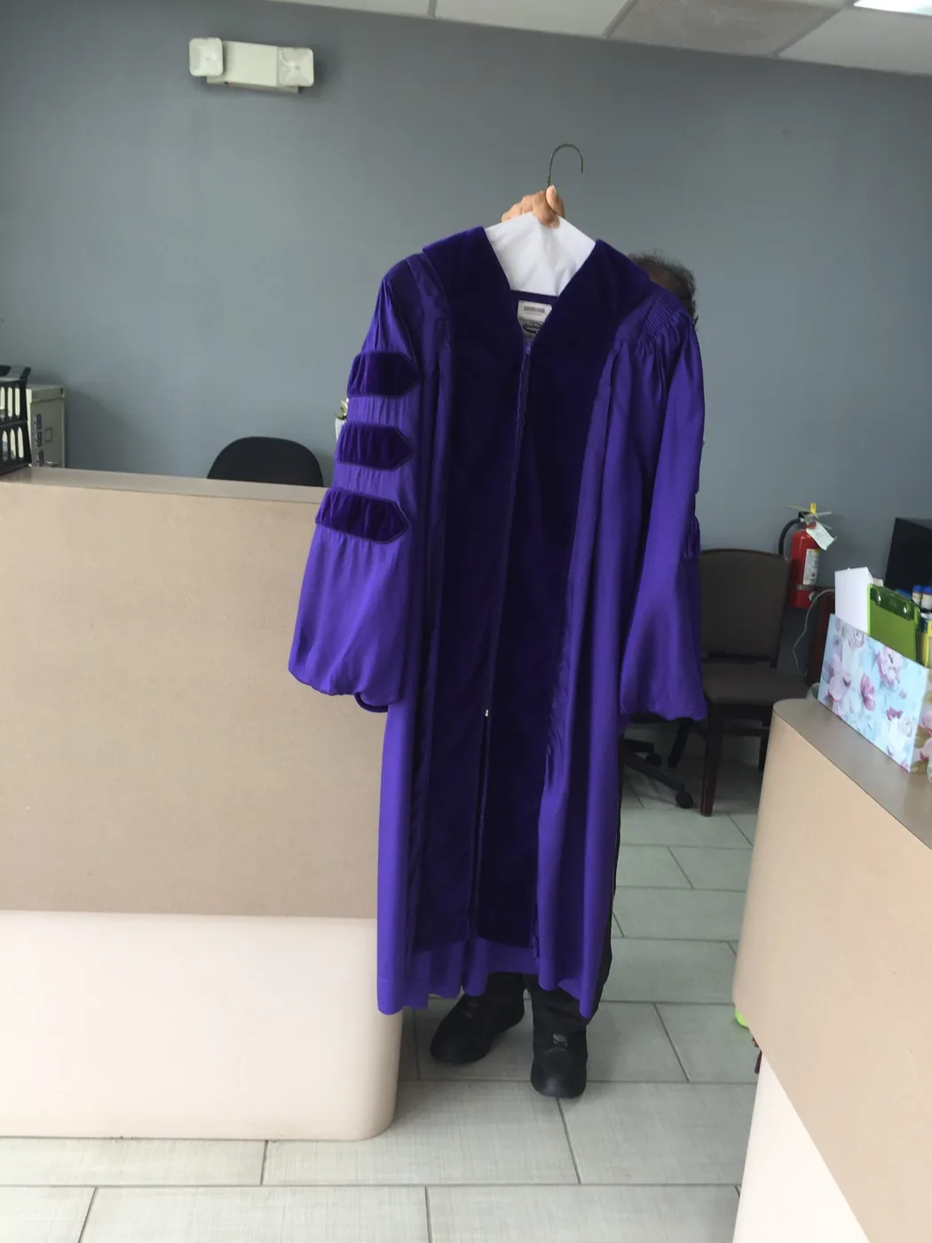 Graduation gown finished at the counter