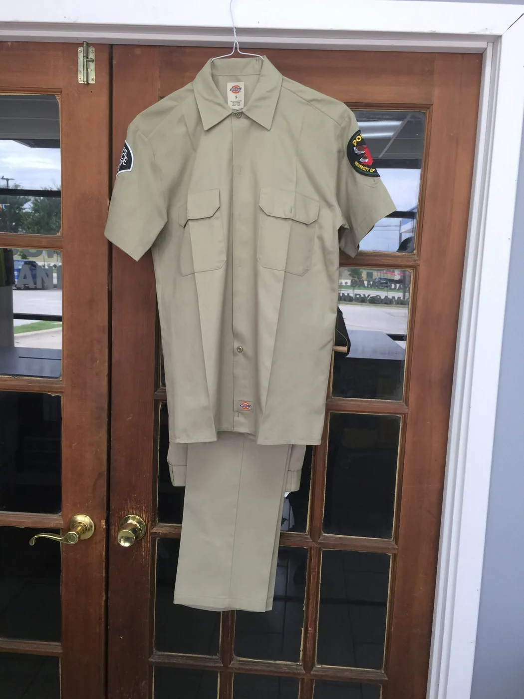 Pressed service uniform shirt and trousers
